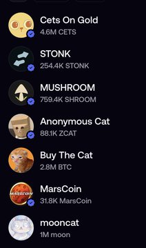 A mobile app screen listing cryptocurrency tokens including 'Cets On Gold (CETS)', 'STONK', 'MUSHROOM (SHROOM)', 'Anonymous Cat (ZCAT)', 'Buy The Cat (BTC)', 'MarsCoin', and 'moonc (moon)'.