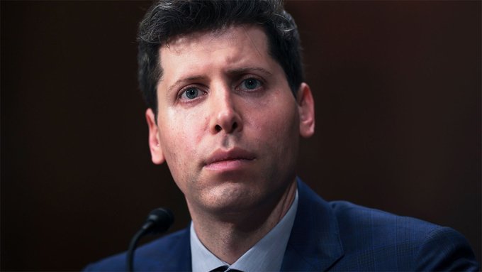 Sam Altman, CEO of OpenAI and a key figure behind the Worldcoin project, is shown in a close-up portrait wearing a dark blue suit and looking off to the side with a serious, contemplative expression during what appears to be a formal hearing or interview.

The image relates to the post about disappointing Worldcoin holders, as Altman's involvement with the cryptocurrency project makes his expression particularly relevant to news that may have unsettled WLD investors.