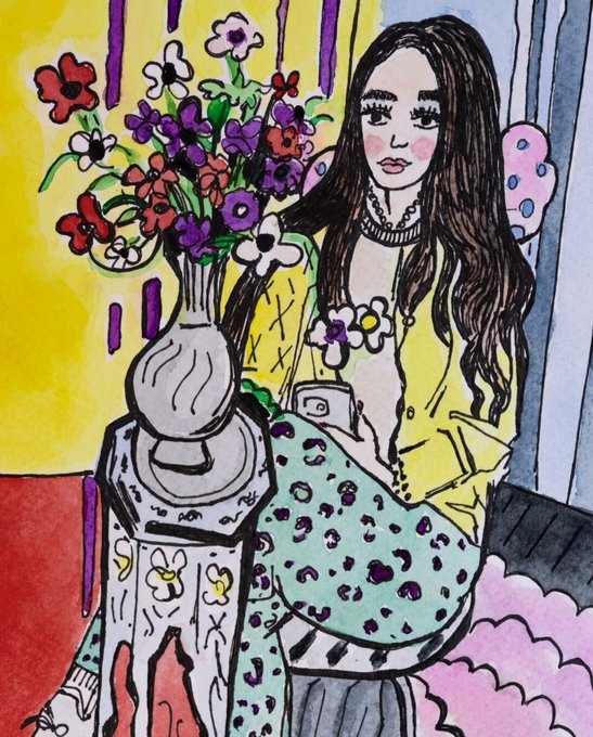 A colorful hand-drawn illustration of a young woman with long brown hair wearing a yellow jacket and leopard-print pants, sitting beside a table with a vase of red and purple flowers.