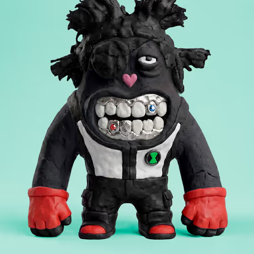 A handmade clay sculpture of a black cartoonish monster character with wild hair, a pink heart on its nose, a wide toothy grin, and red boxing gloves, wearing a black and white outfit with a green symbol on the chest.