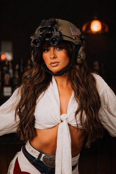 A digitally edited portrait of a woman in a white tied top and shorts with an American flag decal, outfitted with a tactical military helmet and night vision goggles.