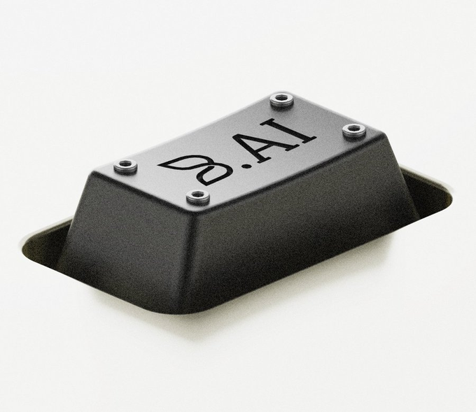 A black rectangular electronic enclosure or project box with mounting flanges on the sides, secured by four screws on top, with the text 'Ω.AI' engraved on its top surface.