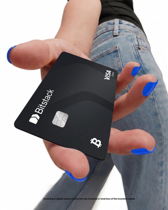 A Bitstack Visa debit card advertisement shows a black card with Bitcoin logo being held by a person with blue nail polish and jeans, with a disclaimer about investing in digital assets.