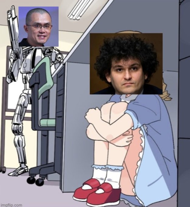 The image is a meme featuring a robot with Changpeng Zhao's (CZ) face holding a gun, pointing it at a curled-up anime girl character whose face has been replaced with Sam Bankman-Fried's. This represents the post's message about Binance's internal security team acting like "hackers" to test employees, contrasting CZ's aggressive stance with SBF's vulnerable appearance after his fraud conviction.