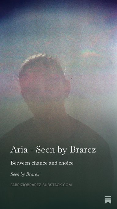 A moody, grainy portrait silhouette of a person looking upward against a hazy sky serves as the cover for the "Aria - Seen by Brarez" newsletter, titled "Between chance and choice," with the website "FABRIZIOBRAREZ.SUBSTACK.COM" displayed at the bottom. The atmospheric image visually reflects the newsletter's introspective theme, as the post introduces a new episode of the weekly column highlighting Tezos artist @ariasixthousand.