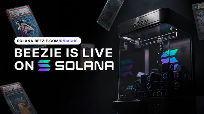 A promotional graphic announcing "Beezie is LIVE on Solana" with the URL solana.beezie.com/R/DACHS, featuring a premium grading machine on the right and graded Pokémon cards floating in the dark background, visually emphasizing the platform's trading card focus launching on the Solana blockchain.