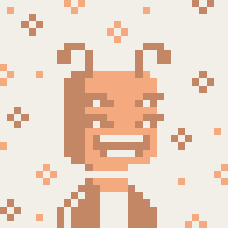 A pixel art illustration of a character surrounded by small orange particles.