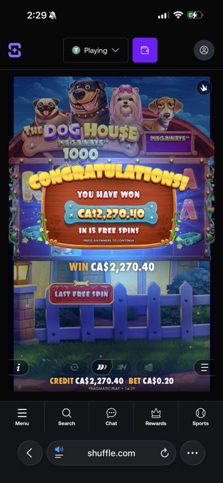 A screenshot from Shuffle.com showing a "Dog House Megaways" slot win of CA$2,270.40 on a CA$0.20 bet, tied to the post's announcement about winning big on the new Dog House slot and planning to give back to the community during a 9pm EST livestream.