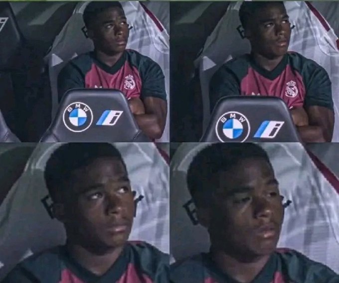 A four-panel screenshot of soccer player Vinícius Jr. wearing a pink and black Real Madrid jersey, sitting in a stadium seat with a BMW logo, looking increasingly tired or bored across the panels.