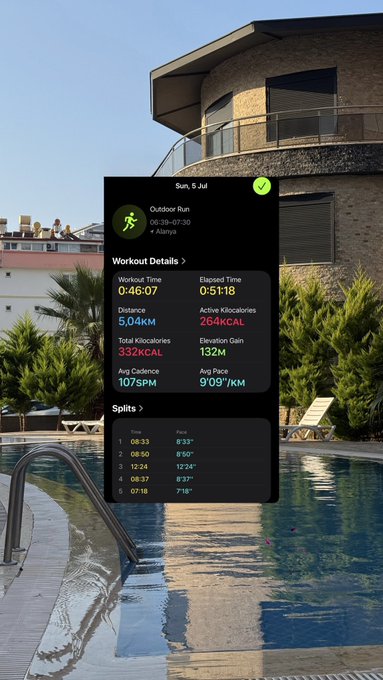 A workout summary screenshot from the Strava app overlaid on a photo of a swimming pool, showing an 'Outdoor Run' on Sun, 5 Jul covering 5.04KM in 46:07 with 332KCAL burned and split times listed below.