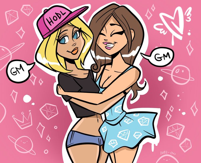 A cartoon illustration of two women hugging on a pink background with diamond and planet doodles; one wears a pink 'HODL' hat and both have speech bubbles saying 'GM'.