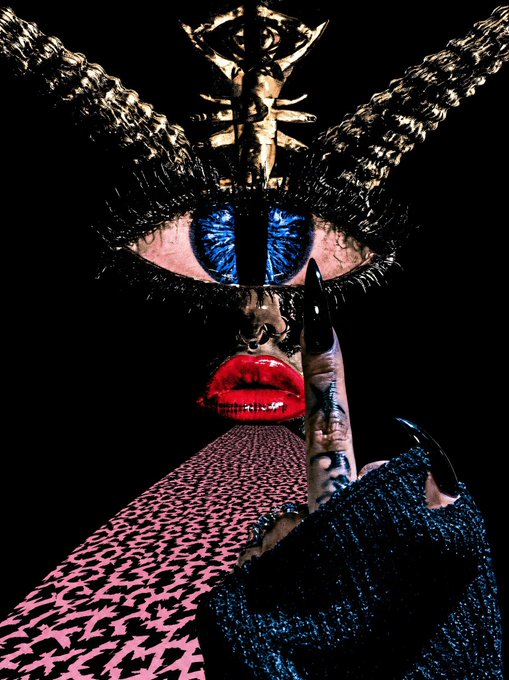 A surreal dark portrait featuring a striking blue eye with elongated lashes, red lips, a long pointed fingernail, and a houndstooth-patterned garment.