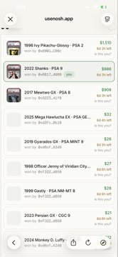 A mobile app screenshot from 'useonah.app' displaying a list of video game listings including titles like '1998 Icy Pikachu-Dexxy - PSA 2', '2022 Sberko - PSA 9', and '2017 Mewtwo GX - PSA 8' with prices.