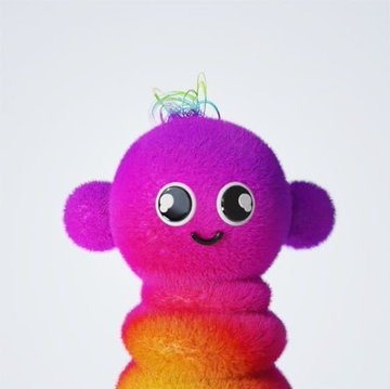 The image shows a cute, multicolored stuffed animal figure wearing a pair of headphones against a white background. The figure has big eyes and a smiley face that makes it appear very friendly and inviting.