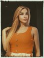 A small image of a woman in an orange top with text reading 'Dani Fox' at the bottom.
