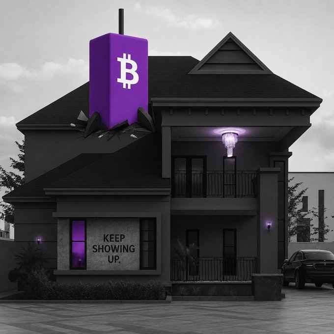 The image shows a modern house in black and white with a striking purple Bitcoin (₿) sculpture emerging from its roof, alongside a wall displaying the text "KEEP SHOWING UP." The selective purple highlights on the Bitcoin symbol and chandelier reinforce the post's message of perseverance in Bitcoin (#BTC) investment, visually tying the "keep showing up" mantra to long-term crypto conviction.