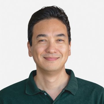 A headshot of a smiling man with dark hair wearing a dark green polo shirt, likely representing a figure associated with Metaplanet's recent Bitcoin acquisition announcement. No text or identifying details are visible in the image.