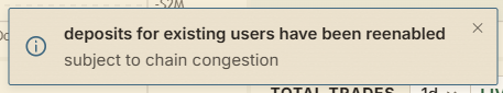 A notification banner stating 'deposits for existing users have been reenabled subject to chain congestion', appearing over a partial view of a trading interface.