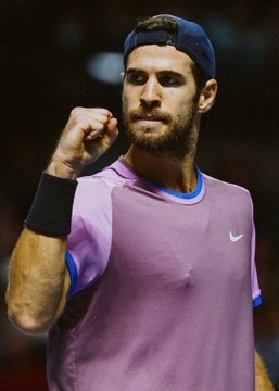 Tennis player Karen Khachanov raises his fist in celebration, pictured amid news that a bettor wagered $340,000 on him to beat Learner Tien on Polymarket, with a potential $780,305 payout.