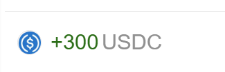 A digital display showing a USDC (US Dollar Coin) logo next to green text reading '+300 USDC', representing a cryptocurrency reward or balance.