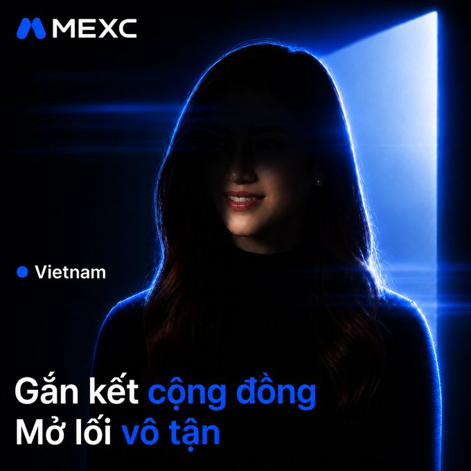 A darkly lit silhouette of a smiling woman with long hair stands against a glowing blue backlight, with the "MEXC" logo and "Vietnam" label displayed alongside the Vietnamese tagline "Gắn kết cộng đồng - Mở lối vô tận." The obscured face plays into the caption's mystery, inviting followers to guess who will be MEXC Vietnam's next ambassador.