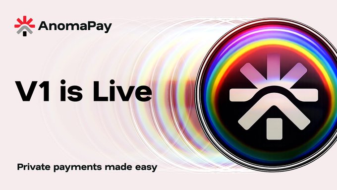 The image features a poster for an online payment platform called AnomaPay, which has a rainbow logo at its center. The poster also includes text that reads "V1 is Live" and "Private payments made easy", indicating that users can easily make transactions through this platform.