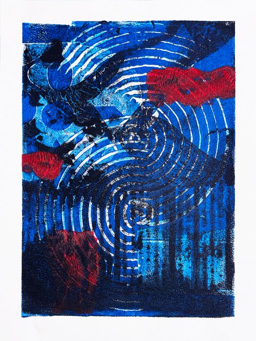 An abstract artwork featuring swirling blue patterns, black textures, and red accents with concentric line designs.