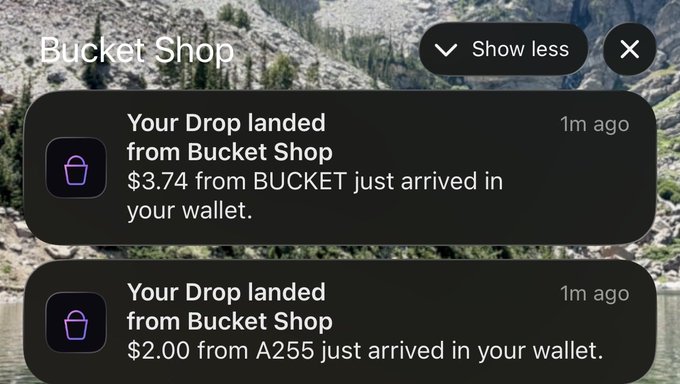 A screenshot of a mobile app interface shows two notifications from 'Bucket Shop' informing the user that drops of $3.74 from BUCKET and $2.00 from A255 have arrived in their wallet.