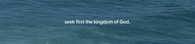 Text reading 'seek first the kingdom of God.' appears overlaid on a view of dark blue water.
