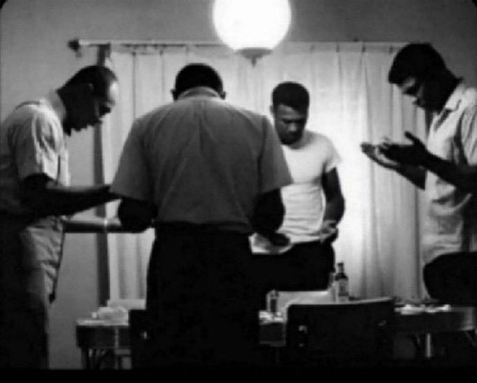 Four men stand with heads bowed in what appears to be a prayer or pre-meeting moment in a dimly lit room with a hanging lamp, conveying a sense of reverence and solidarity. The image reflects the post's spiritual or appreciative tone, suggesting a morning prayer or moment of gratitude before engaging with the mentioned platform @TermMaxFi.