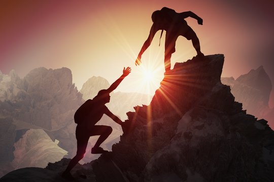 The image shows two people climbing a mountain together, with one person reaching out for help from the other as they ascend. The scene conveys the message about the importance of knowledge sharing and collaboration rather than focusing solely on personal achievements or ego-driven thinking.
