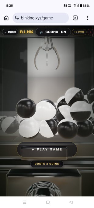 A mobile screenshot of the Blinkinc.xyz claw machine game interface showing balls in the bin, a play button, and 'COSTS 3 COINS' text.