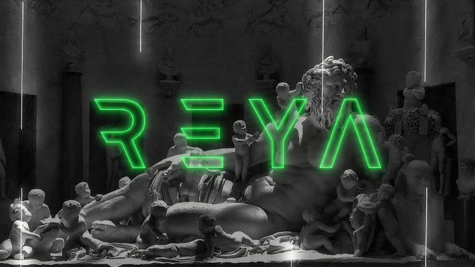 The image shows a classical sculpture of a bearded figure surrounded by cherubs in grayscale, overlaid with the bright green glowing "REYA" logo, branding the crypto trading platform mentioned in the post about its unified cross-margin account for crypto perps and spot trading.