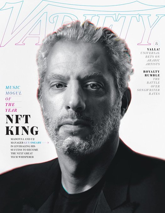 A black-and-white Variety magazine cover featuring a close-up portrait of Guy Oseary, headlined "NFT KING — MUSIC MOGUL OF THE YEAR" with text noting "Madonna and U2 manager Guy Oseary is leveraging his success to become the next great tech whisperer." The accompanying post "(disgraced former) NFT King" underscores how Oseary's title as a leading NFT figure has since lost its luster amid the collapse of the NFT market.