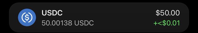 A dark-themed digital wallet interface displaying a USDC balance of '50.00138 USDC' valued at '$50.00' with a '+<$0.01' change indicator.