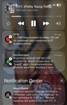 An iPhone screenshot showing the lock screen with music playback for 'Y.T. (Pretty Young Thing)' by Michael Jackson, along with notification banners for GTM, Orchestrator, and Maya Phone, plus the Notification Center open at the bottom.