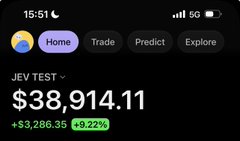 A mobile app screenshot displaying a portfolio value of $38,914.11 (up $8,286.35 or +9.22%) under a 'NEW TEST' label, with navigation tabs for Home, Trade, Predict, and Explore.