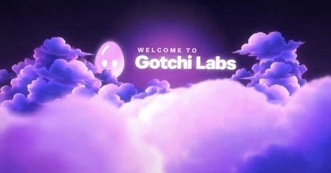 A stylized animated graphic displays 'WELCOME TO Gotchi Labs' in white text against a backdrop of fluffy purple and pink clouds with a small ghost-like character.