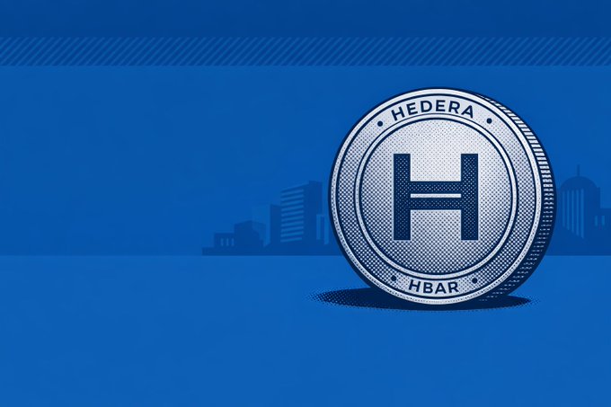 A digital illustration of a silver Hedera (HBAR) cryptocurrency coin against a blue background with a city skyline silhouette.