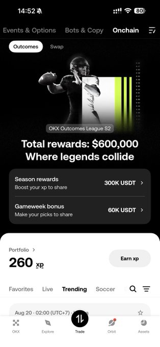 A mobile app screenshot of the OKX platform featuring the 'OKX Outcomes League S2' promotion with a total reward pool of $600,000, showing a portfolio of 260 xp.