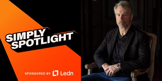 Promotional graphic with "SIMPLY SPOTLIGHT" text on an orange and black diagonal design, featuring a photograph of a mature man in a dark blazer sitting in a chair, sponsored by Ledn.