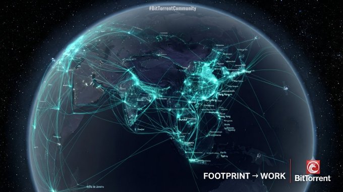 A digital graphic of Earth shows a glowing teal network of connections across North America with the text '#BitTorrentCommunity', 'FOOTPRINT → WORK', and a 'BitTorrent' logo in the corner.