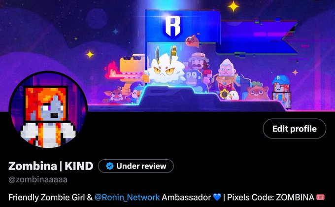 Twitter/X profile for "Zombina | KIND" (@zombinaaaaa), featuring a pixel-art zombie avatar, with a banner showing Ronin Network characters and a Pixels code of ZOMBINA.