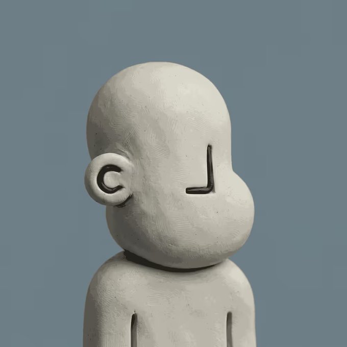 The image features a small white sculpture of a person's head, which appears to be made out of clay or plaster. The sculpture has a unique design with a face and two ears, giving it an interesting and artistic appearance. The sculpture is placed against a blue background, making it stand out even more.