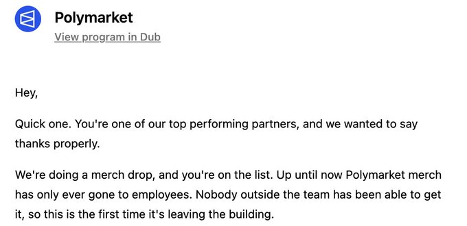 A screenshot of a message from Polymarket announcing an exclusive merchandise drop for top partners, with the visible text "Hey, Quick one. You're one of our top performing partners, and we wanted to say thanks properly. We're doing a merch drop, and you're on the list. Up until now Polymarket merch has only ever gone to employees." The image relates to the post by showing the notification that granted the user access to the limited Polymarket merch drop they're now wearing.