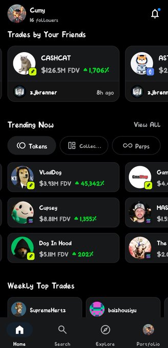 A mobile app screenshot showing 'Trades by Your Friends' featuring CASHCAT ($126.5M FDV, +1,706%) and a 'Trending Now' section with VladDog (+45,342%), Cupsey (+1,335%), and Dog In Hood (+202%).