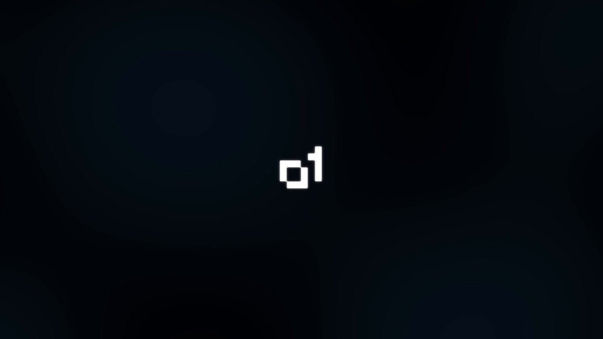 The image features a black background with white text that reads "@o1 @DEX Aggregator" written in all capital letters, positioned at the center of the frame. The surrounding area appears to be a dark gray color, which contrasts with the white text and makes it stand out more prominently. This design choice suggests that the image is meant to draw attention to the content within or possibly promote an online platform called "@o1 @DEX Aggregator".
