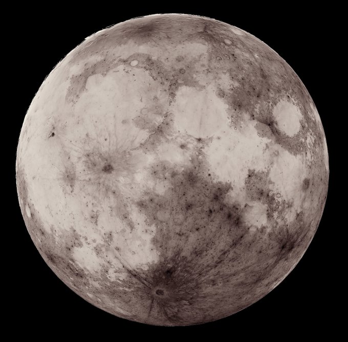 A detailed black-and-white photograph of a full moon against a black background, showing its cratered surface and dark maria regions.