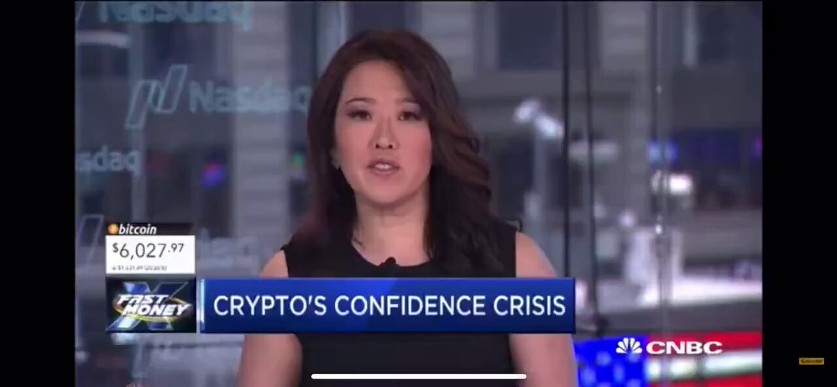 The image shows an article with a woman's face displayed over a report about the decline of Bitcoin prices due to a crisis. The title of the photo reads "“Today, we are having a funeral for Bitcoin.” - CNBC, June 2018 Bitcoin price then: $6,027 Bitcoin price today: $63,000". The image focuses on the woman in front and her features, while also providing information about the decline of Bitcoin prices during that period.