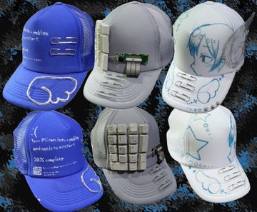 The image features six hats with various designs and colors, including blue, white, black, and gray. The hats are displayed against a black background, making their colors stand out prominently. One of the hats has a unique design that includes a keyboard attached to its side, which is likely an artistic or creative statement. The post about selling these hats seems to be promoting them as one-of-a-kind items with no other buyers in sight.